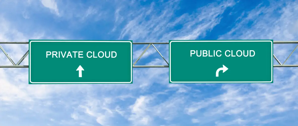 two freeway road signs. One says, Private Cloud. The other says public cloud.