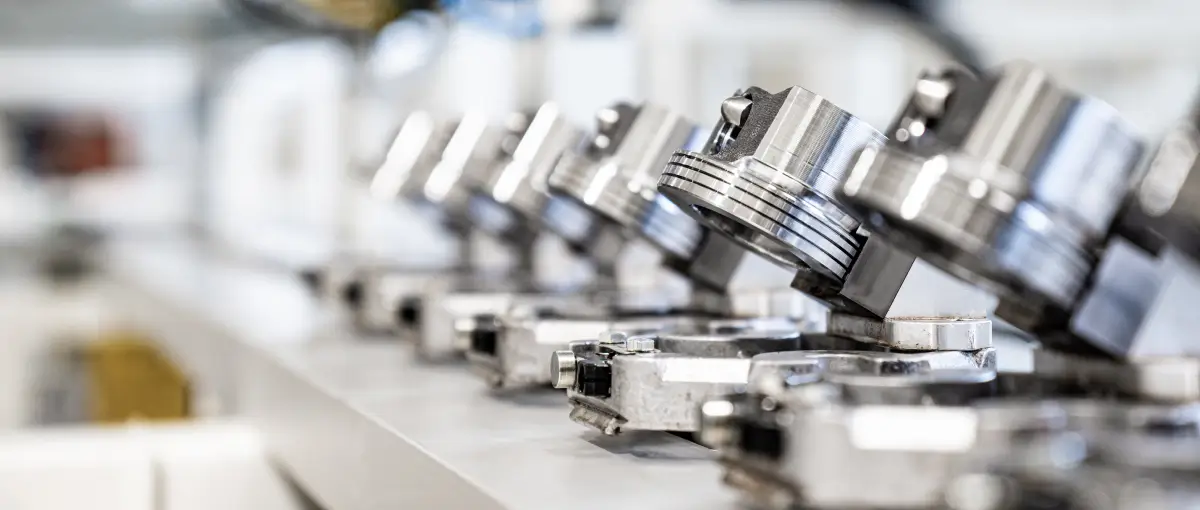 Photo of a production line for auto parts at a factory.