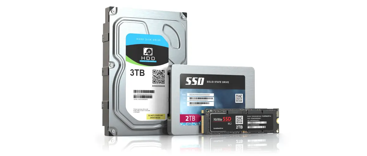 An image of a hard disk drive and two solid-state drives on a blank background.