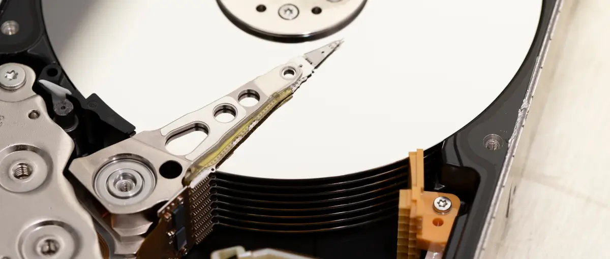 A close-up image inside of a hard disk drive (HDD).