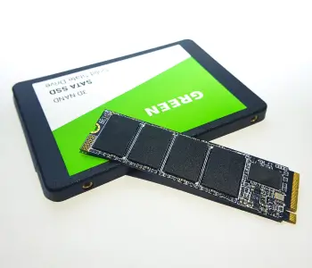 A close-up image of the circuit board inside of a SATA solid-state drive.