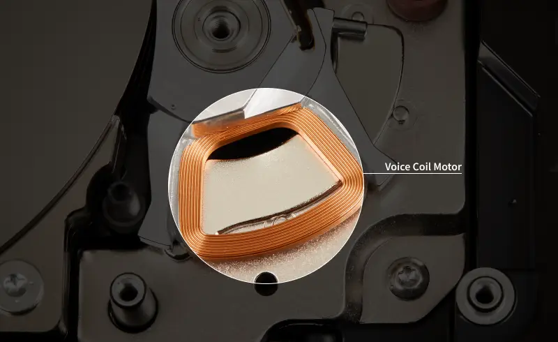 An image highlighting a hard drive’s voice coil motor.