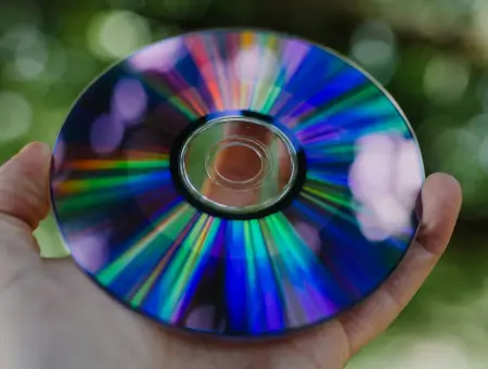 An image showing a stack of optical media.